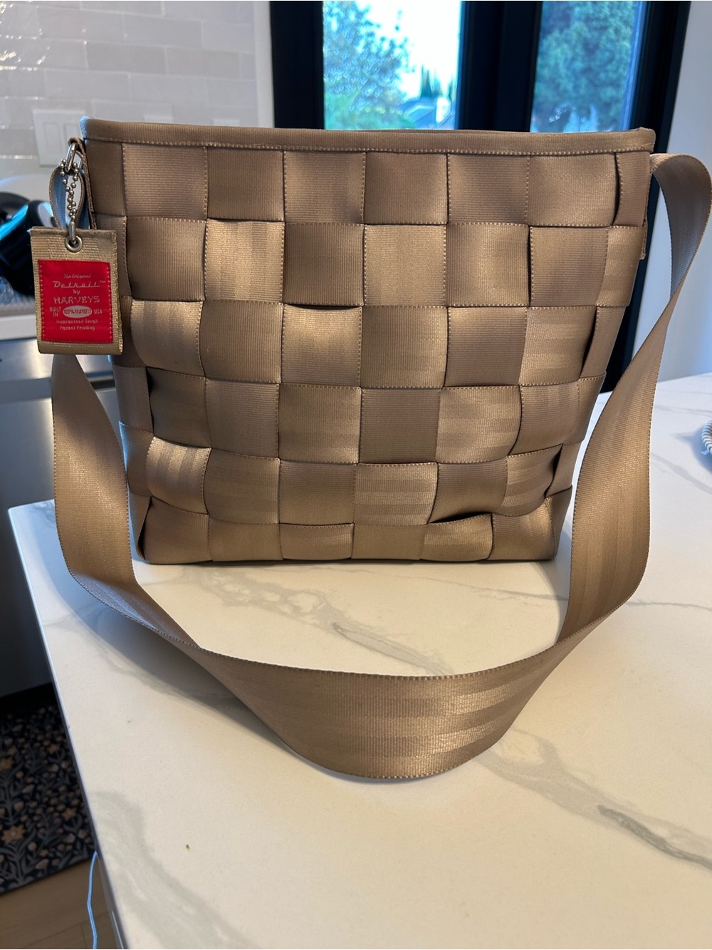 Harvey’s The Original Crossbody Shoulder Bag - Taupe. 13” x 11” x 4”